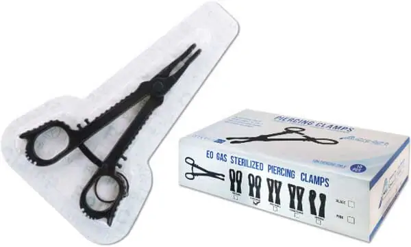 sterilised clamps and forceps for body piercings