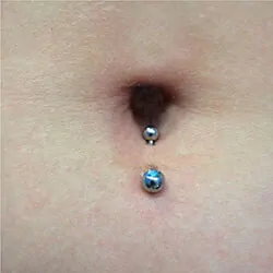 A lower navel piercing