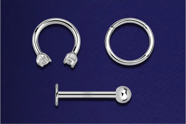Three different types of piercing jewellery made of surgical steel