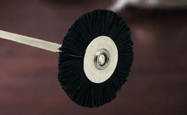 A brushing tool used to create a brushed finishing