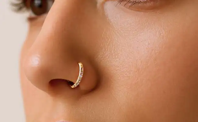 Closeup of a nose adorned with a nose hoop